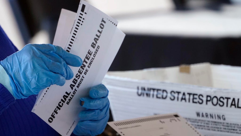 Absentee ballot issues may disenfranchise thousands of metro Atlanta voters, lawsuit claims — Suwanee Community news
